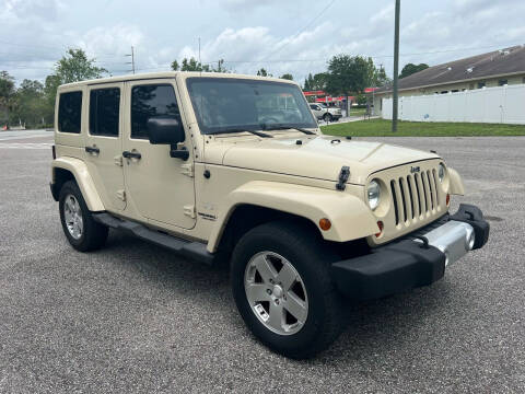 2011 Jeep Wrangler Unlimited for sale at VASS Automotive in Deland FL