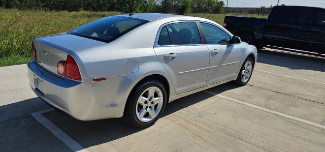 2010 Chevrolet Malibu for sale at CAR MARKET AUTO GROUP in Sugar Land, TX