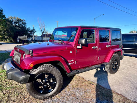 2013 Jeep Wrangler Unlimited for sale at Blum's Auto Mart in Port Orange FL