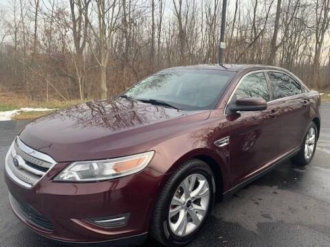 2011 Ford Taurus for sale at Lighthouse Auto Sales in Holland MI