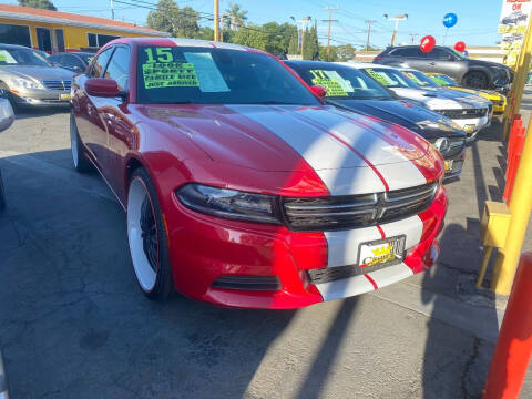 2015 Dodge Charger for sale at CROWN AUTO INC, in South Gate CA