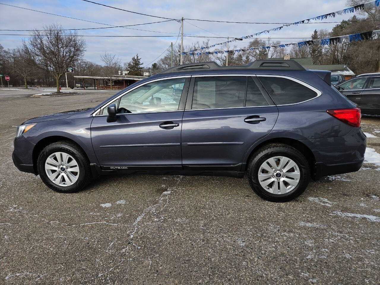 2017 Subaru Outback for sale at DANGO AUTO SALES in HOWARD CITY, MI