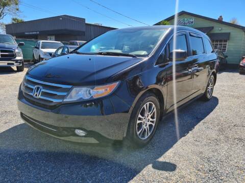 2014 Honda Odyssey for sale at Velocity Autos in Winter Park FL