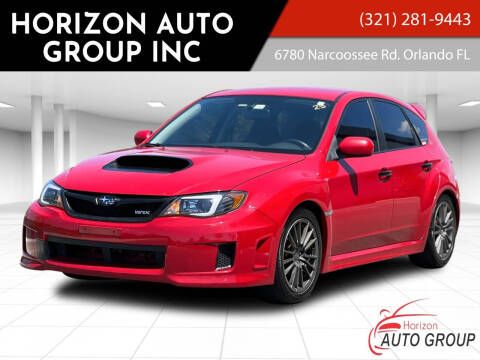 2011 Subaru Impreza for sale at HORIZON AUTO GROUP INC in Orlando FL