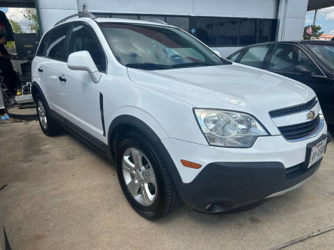 2014 Chevrolet Captiva Sport for sale at Buy-Fast Autos in Houston TX