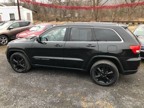 2012 Jeep Grand Cherokee for sale at George's Used Cars Inc in Orbisonia PA