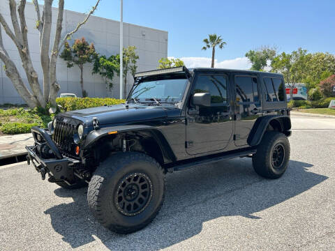 2011 Jeep Wrangler Unlimited for sale at Trade In Auto Sales in Van Nuys CA
