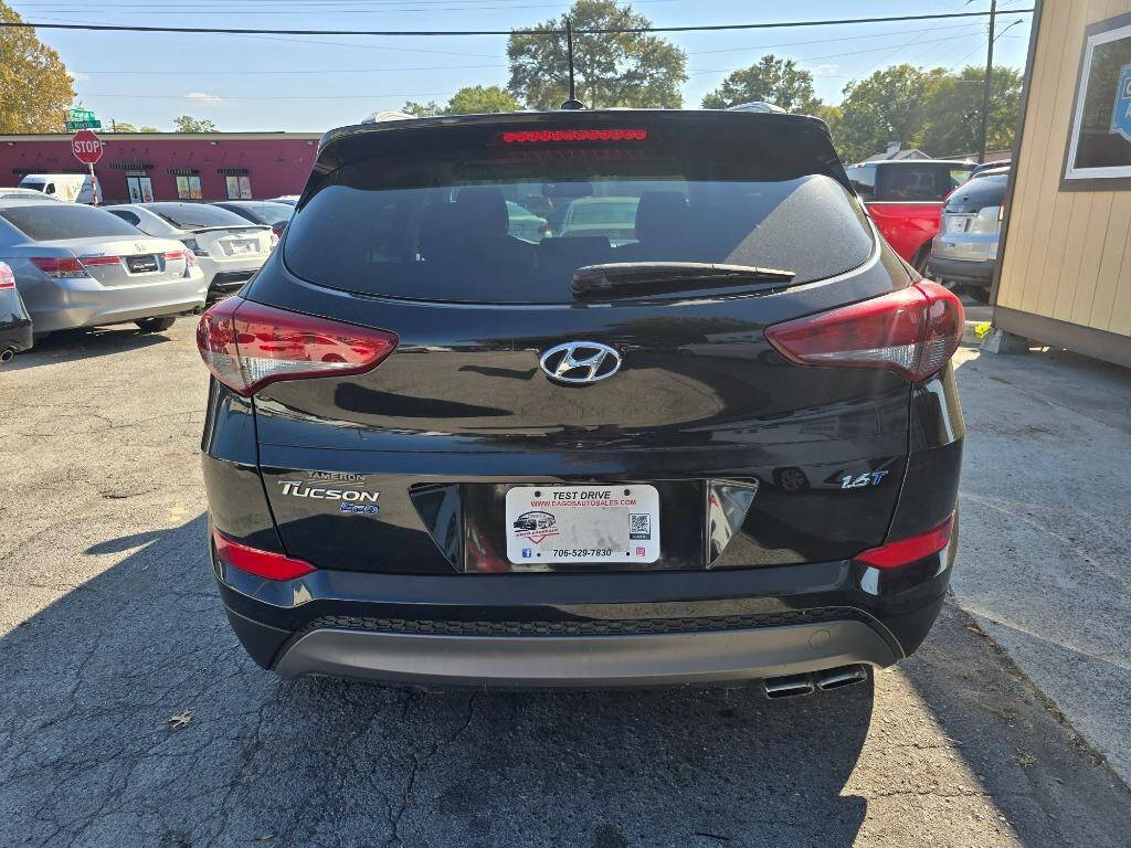 2016 Hyundai TUCSON for sale at DAGO'S AUTO SALES LLC in Dalton, GA