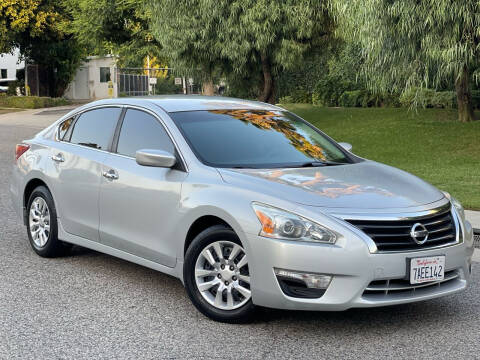 2013 Nissan Altima for sale at MILLENNIUM MOTORS in Van Nuys CA