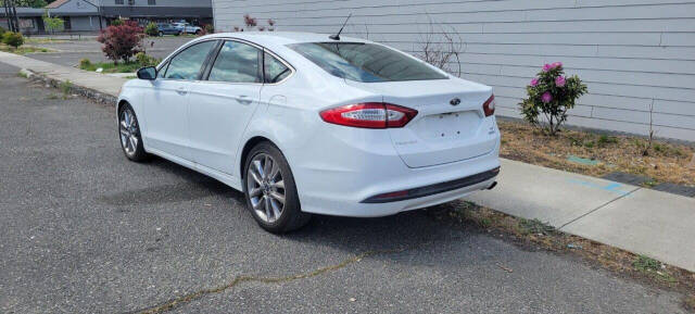 2015 Ford Fusion for sale at BENCHMARK AUTO SALES in Parkland, WA