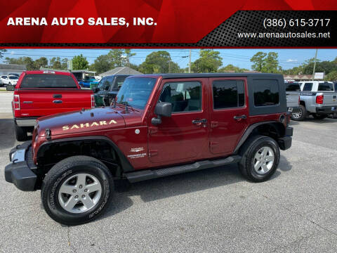 2010 Jeep Wrangler Unlimited for sale at ARENA AUTO SALES,  INC. in Holly Hill FL