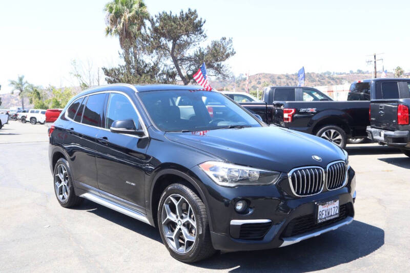 Used 2018 BMW X1 28i with VIN WBXHT3C38J5L24144 for sale in San Diego, CA