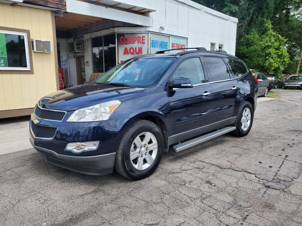 2012 Chevrolet Traverse for sale at DAGO'S AUTO SALES LLC in Dalton, GA