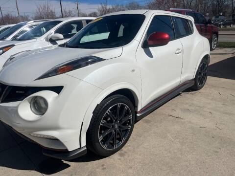2014 Nissan JUKE for sale at Azteca Auto Sales LLC in Des Moines IA