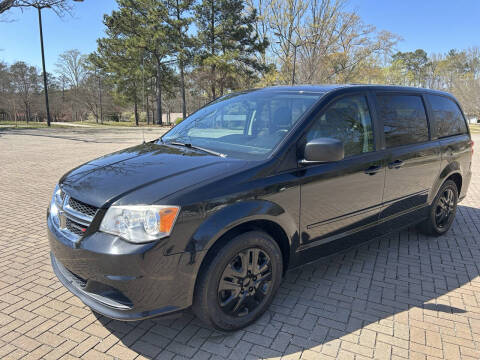 2014 Dodge Grand Caravan for sale at PFA Autos in Union City GA