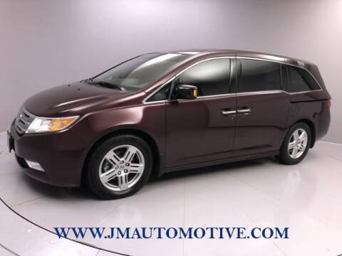 2011 Honda Odyssey for sale at J & M Automotive in Naugatuck CT