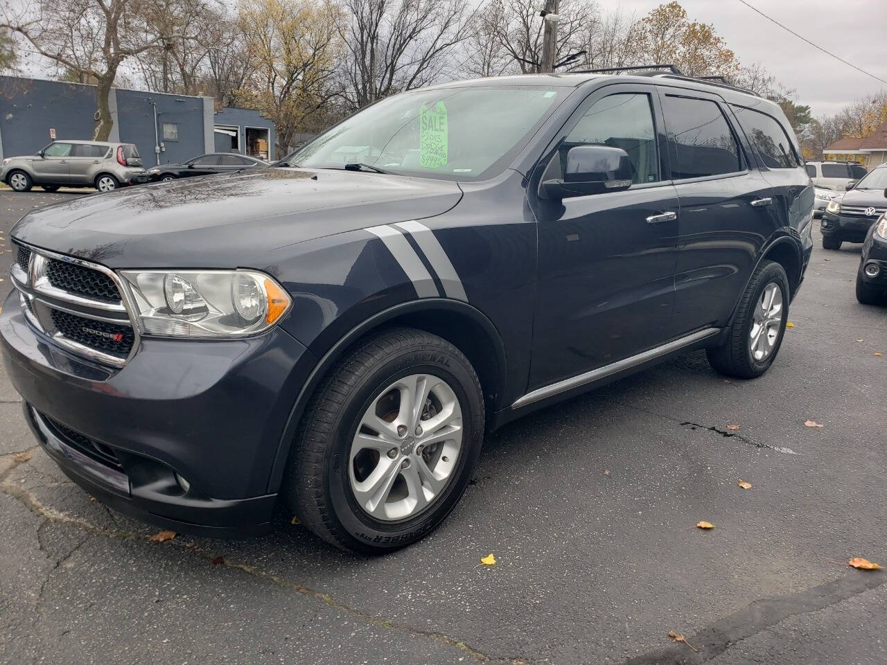 2013 Dodge Durango for sale at Auto Shop in Wyoming, MI