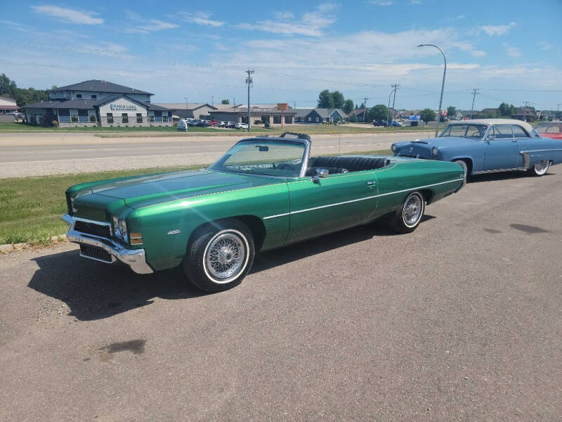 https://cdn05.carsforsale.com/00c6aac1fbcfac554d4eed60f4baef1e38/800x600/1972-chevrolet-impala-2dr-convertible.jpg