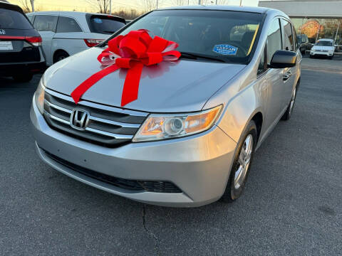 2012 Honda Odyssey for sale at Charlotte Auto Group, Inc in Monroe NC