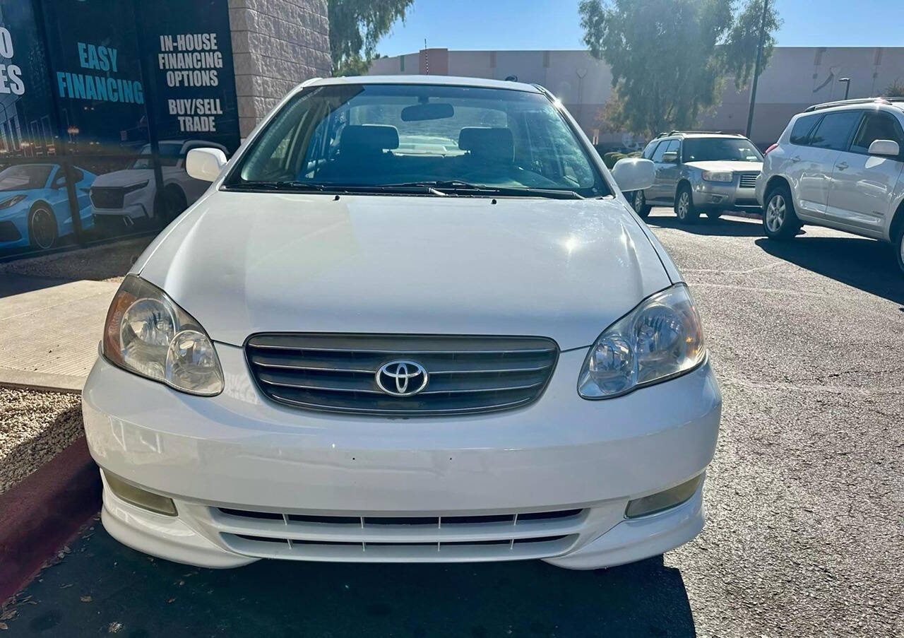 2004 Toyota Corolla for sale at HUDSONS AUTOS in Gilbert, AZ