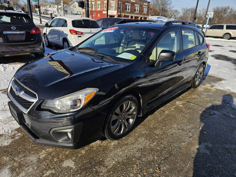 2014 Subaru Impreza for sale at Charles Auto Sales in Springfield MA