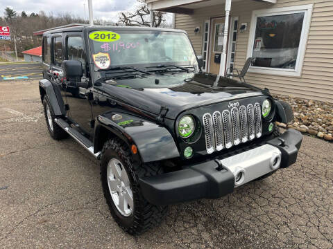 2012 Jeep Wrangler Unlimited for sale at G & G Auto Sales in Steubenville OH