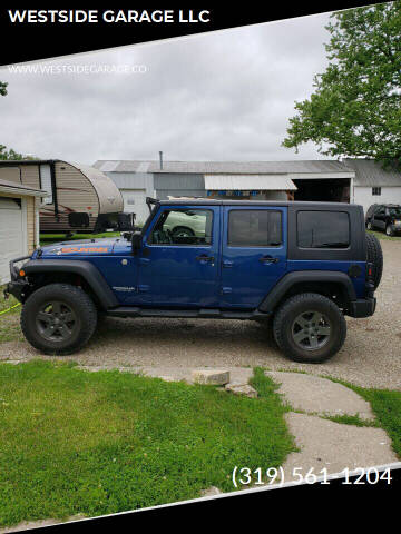 2010 Jeep Wrangler Unlimited for sale at WESTSIDE GARAGE LLC in Keokuk IA