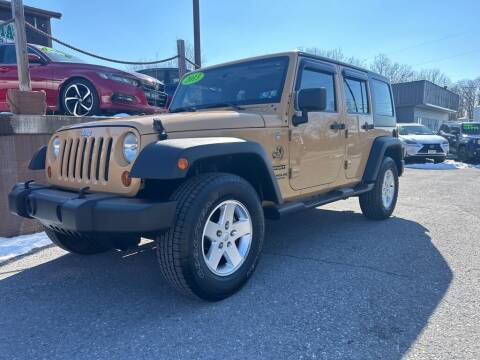 2013 Jeep Wrangler Unlimited for sale at WORKMAN AUTO INC in Bellefonte PA