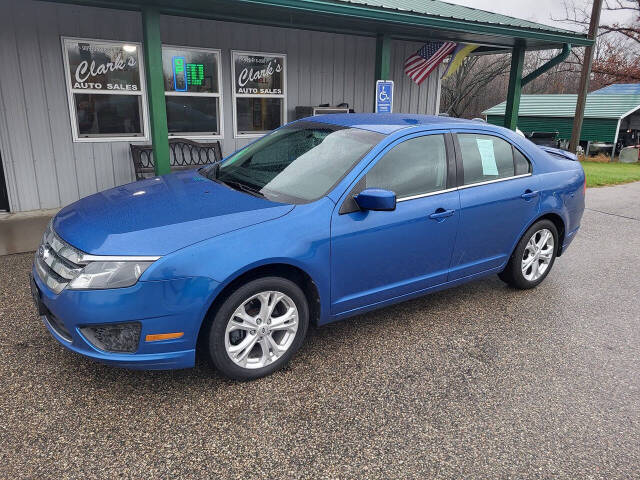 2012 Ford Fusion for sale at Clarks Auto Sales Inc in Lakeview, MI