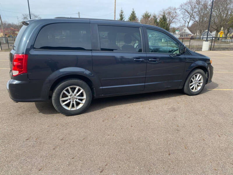 2014 Dodge Grand Caravan for sale at Mikhos 1 Auto Sales in Lansing MI