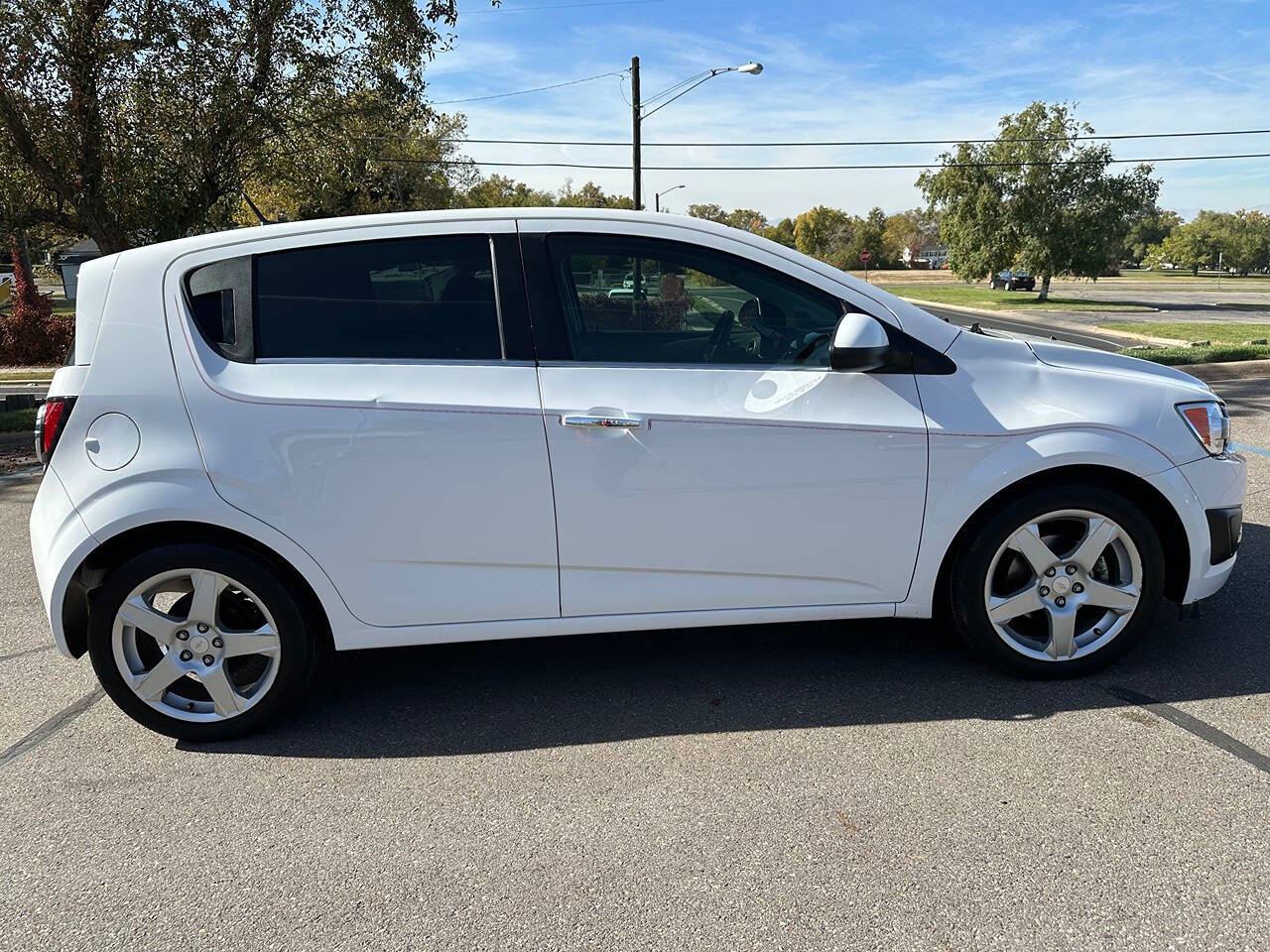 2014 Chevrolet Sonic for sale at DRIVE N BUY AUTO SALES in OGDEN, UT