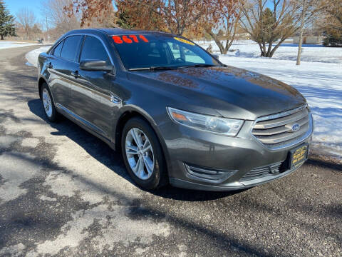 2015 Ford Taurus for sale at BELOW BOOK AUTO SALES in Idaho Falls ID