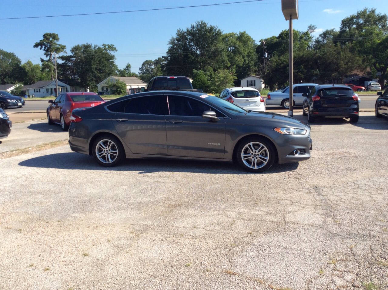 2015 Ford Fusion Hybrid for sale at SPRINGTIME MOTORS in Huntsville, TX