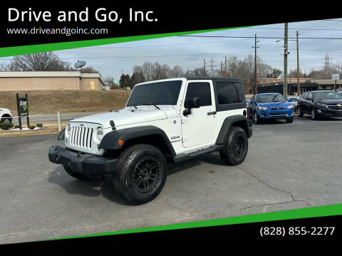 2014 Jeep Wrangler for sale at Drive and Go, Inc. in Hickory NC