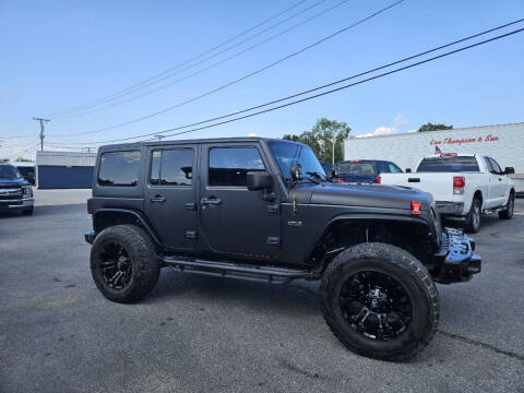 2016 Jeep Wrangler Unlimited for sale at CarTime in Rogers AR