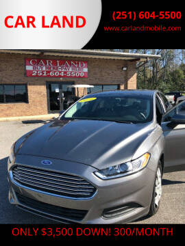 2014 Ford Fusion for sale at CAR LAND in Mobile AL