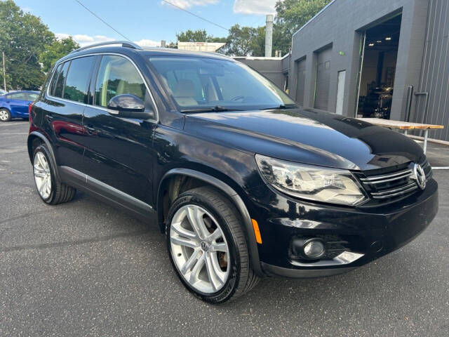 2013 Volkswagen Tiguan for sale at Auto Shop in Wyoming, MI