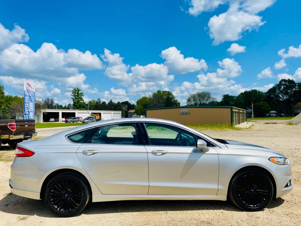 2016 Ford Fusion for sale at Top Gear Auto Sales LLC in Le Roy, MN