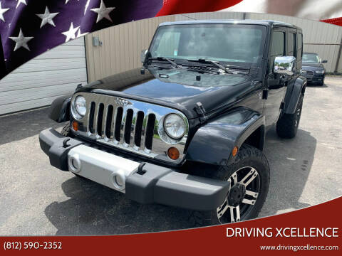 2012 Jeep Wrangler Unlimited for sale at Driving Xcellence in Jeffersonville IN
