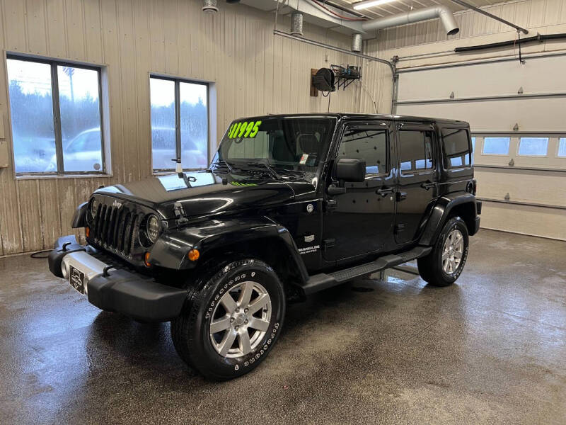 2011 Jeep Wrangler Unlimited for sale at Sand's Auto Sales in Cambridge MN