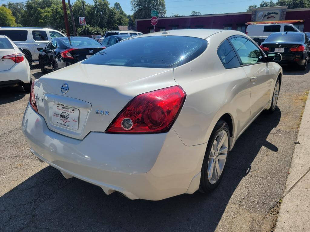 2012 Nissan Altima for sale at DAGO'S AUTO SALES LLC in Dalton, GA