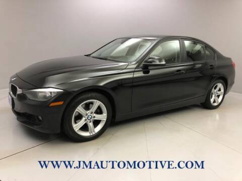 2014 BMW 3 Series for sale at J & M Automotive in Naugatuck CT