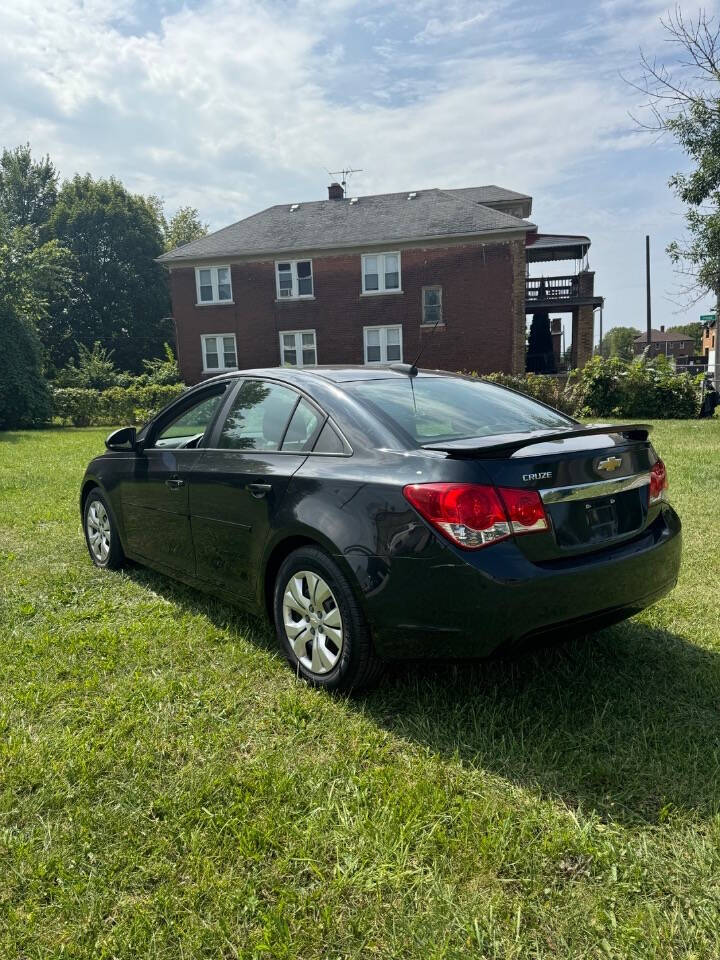 2015 Chevrolet Cruze for sale at H & H AUTO GROUP in Detroit, MI