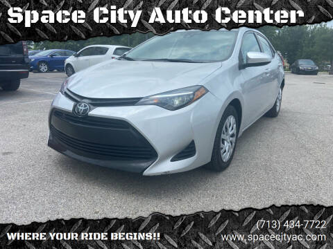 2019 Toyota Corolla for sale at Space City Auto Center in Houston TX