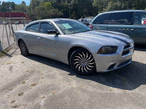 2014 Dodge Charger for sale at Certified Motors LLC in Mableton GA