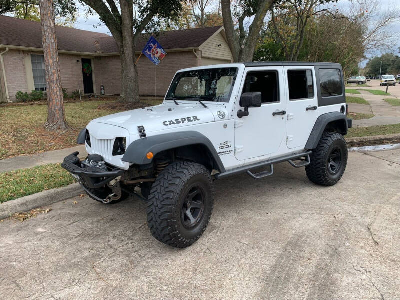 2014 Jeep Wrangler Unlimited for sale at Demetry Automotive in Houston TX