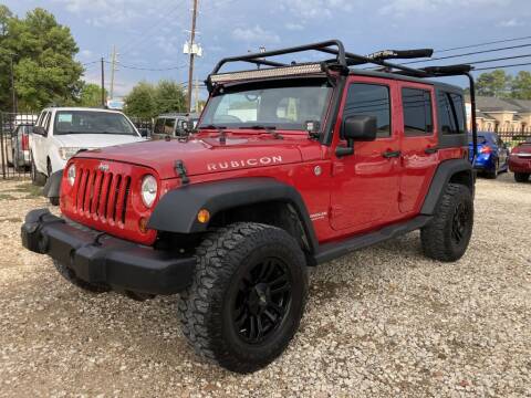 2012 Jeep Wrangler Unlimited for sale at CROWN AUTO in Spring TX