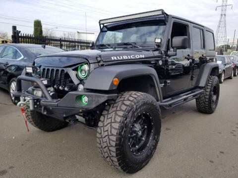 2014 Jeep Wrangler Unlimited for sale at 916 Auto Mart in Sacramento CA
