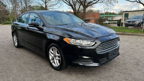 2014 Ford Fusion for sale at Horizon Auto Sales in Raleigh NC