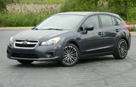 2014 Subaru Impreza for sale at MOKENA AUTOMOTIVE INC in Mokena IL